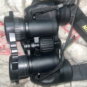 Nikon Action 7X35 Black Compact Binoculars with Yellow Logo Accent